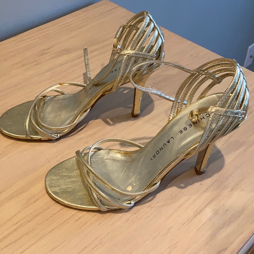 Gently used gold strappy sandals